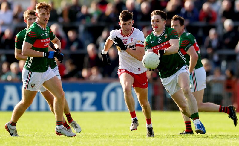 Tyrone’s Ciaran Daly and Mayo's Paddy Durcan. Photograph: James Crombie/Inpho