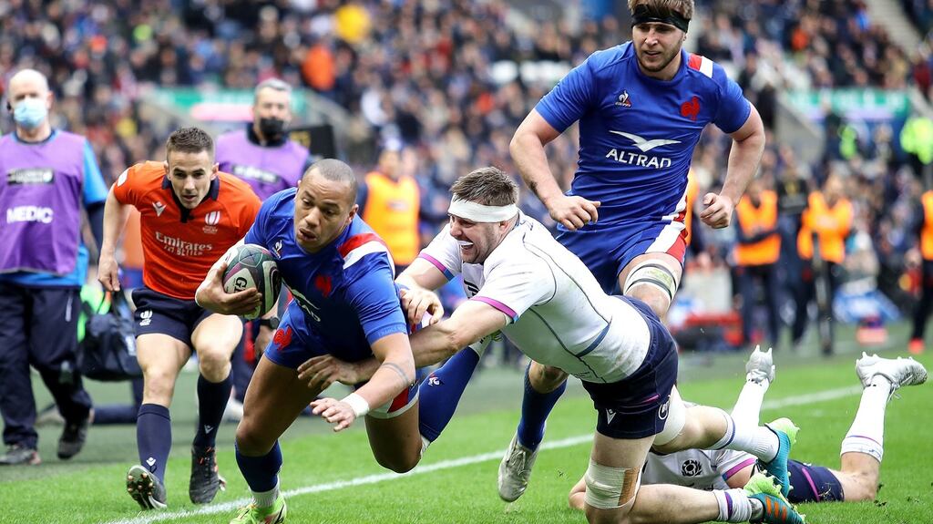 France’s Gael Fickou scores a try despite the efforts of Scotland’s Rory Darge during the Six Nations match at Murrayfield. Photograph: Laszlo Geczo/Inpho