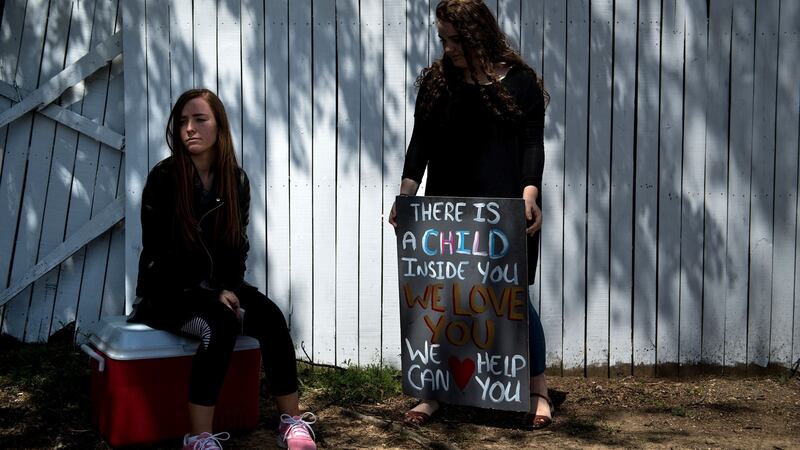 Pro-life activists wait for patients to arrive outside the Jackson Women’s Health Organisation. Photograph: Brendan Smialowski/AFP via Getty