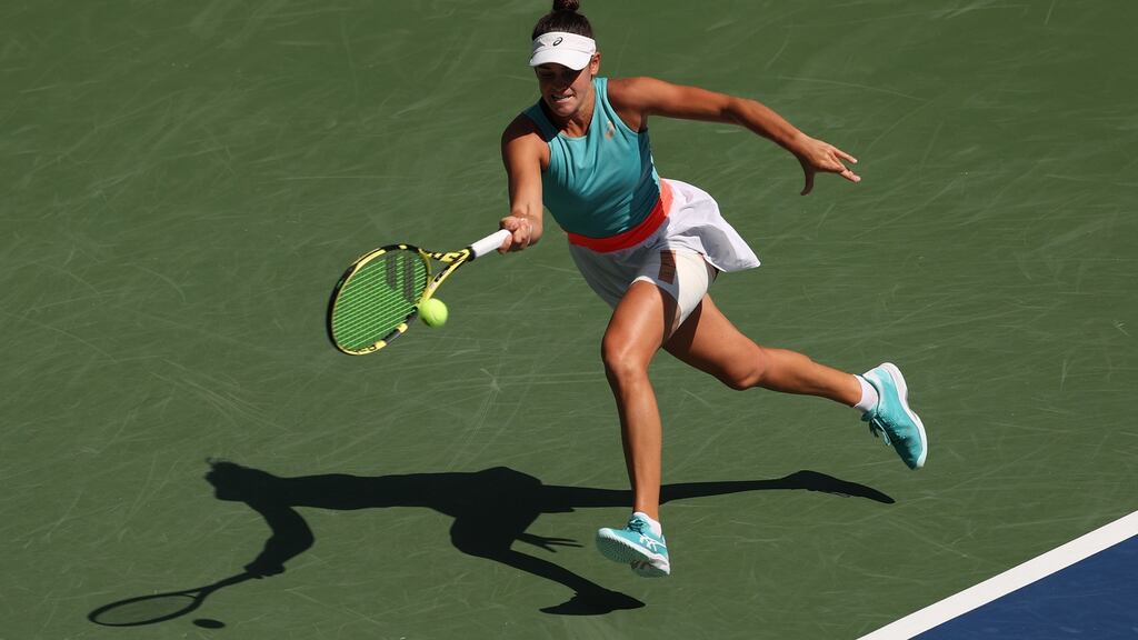 Jennifer Brady of the United States returns the ball during her women’s singles quarter-final match against Yulia Putintseva of Kazakhstan at the US Open. Photograph: Al Bello/Getty Images