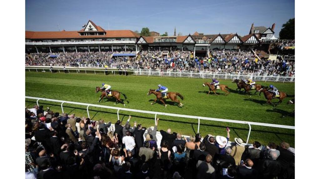 Eddie Ahern riding Overturn (L) led all the way to win The totesport.com Chester Cup at Chester. Photograph: Alan Crowhurst/ Getty Images