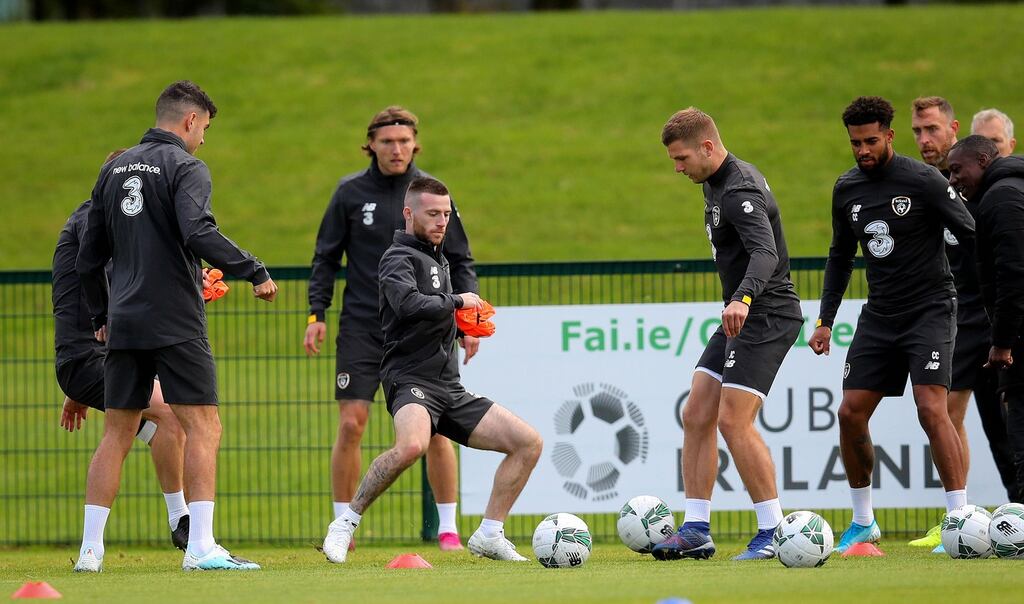 Ireland’s Jack Byrne and James Collins during training ahead of the friendly against Bulgaria on Tuesday. Photo: Ryan Byrne/Inpho
