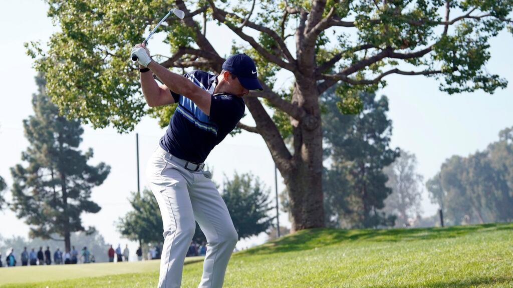 Rory McIlroy hits his second shot from the rough on the second hole during the final round of the Genesis Invitational at Riviera Country Club. Photo: Ryan Kang/AP Photo
