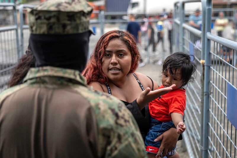 An Ecuadorian soldier blocks the entrance of a prison in Guayaquil this week as family members of people taken into custody try to inquire about their loved ones. Photograph: John Moore/Getty Images