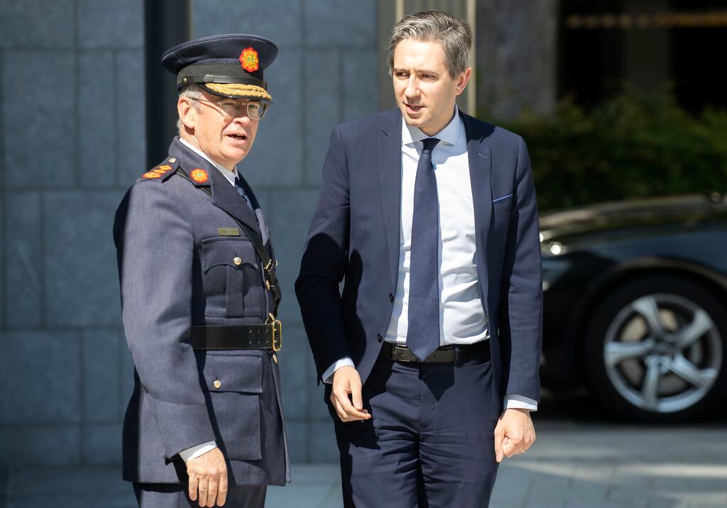 Garda Commissioner Drew Harris and Simon Harris: The Minister has brought forward compromise proposals for FRT to be used in limited circumstances with the intention to add them to the body-cam legislation. Photograph: Colin Keegan, Collins Dublin