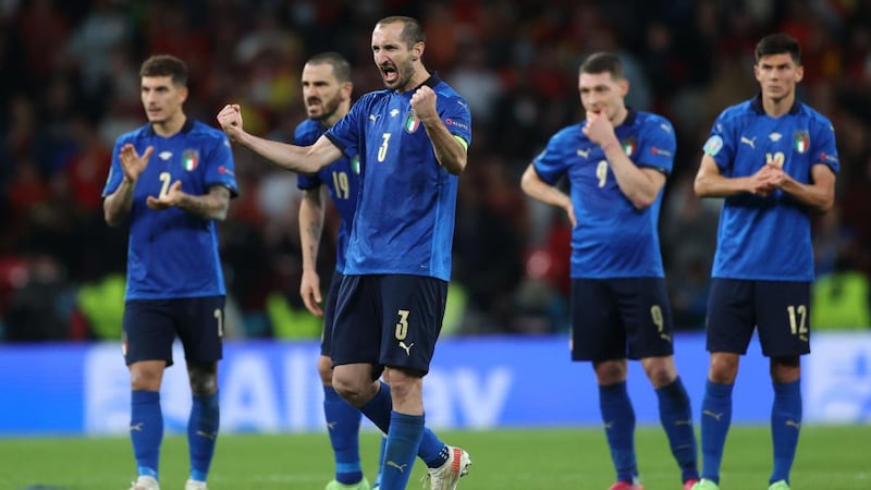 Italy's Giorgio Chiellini celebrates during the penalty shoot-out againbst Spain. Photograph: Carl Recine/Getty Images