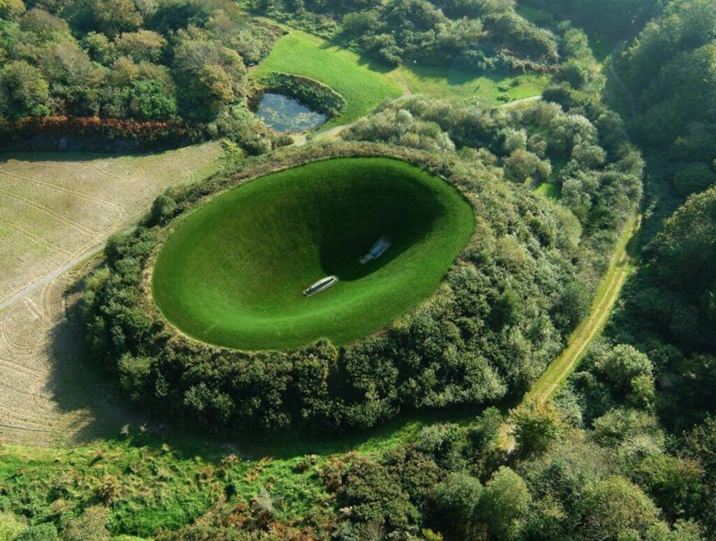 James Turrell’s strangely calming “Irish Sky Garden”: a deep, grassy hollow wherein, when you lie on a stone bed in the centre and gaze upwards, the sky is framed by a green oval