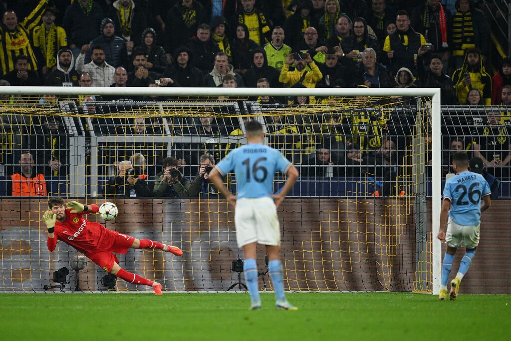 Manchester City's Riyad Mahrez has a penalty saved by Borussia Dortmund goalkeeper Gregor Kobel during the Champions League match at Signal Iduna Park. Photograph: Matthias Hangst/Getty Images