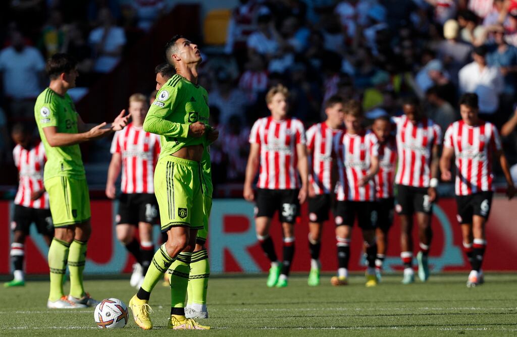 Manchester United's Cristiano Ronaldo reacts as Brentford celebrate their fourth goal against his team. Photograph: Getty Images