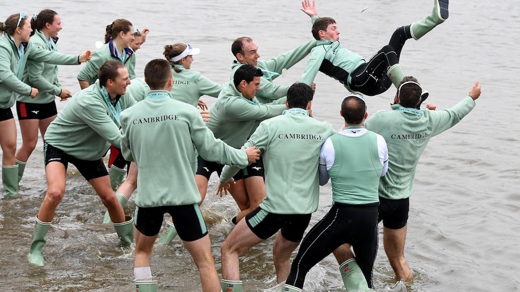 The Cambridge University Boat Club celebrate after winning the Men’s and Women’s Boat Race. Photo: Justin Setterfield/Getty Images