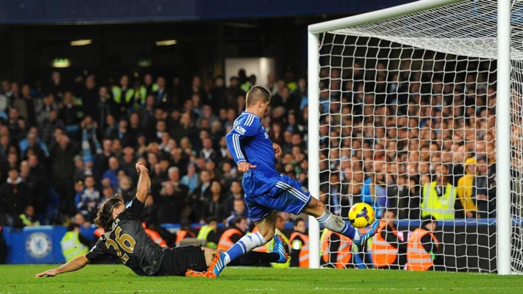 Chelsea’s Fernando Torres score’s his side’s second goal of the game during the Barclays Premier League match at Stamford Bridge. Photograph: Dominic Lipinski/PA Wire