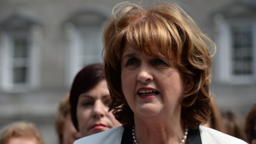 Tánaiste Joan Burton declared that the budget next month would bring a close to the austerity era. Photograph: Dara Mac Donaill