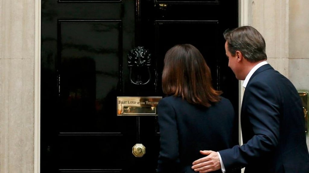 Britain’s prime minister David Cameron and his wife Samantha return to 10 Downing Street after Britain’s general election, in London. Photograph: Stefan Wermuth/Reuters