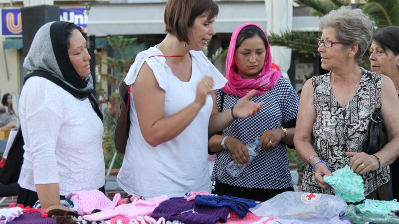 Refugee women exhibit their handcrafts at a market in the central square on Lesbos. Photograph: ActionAid