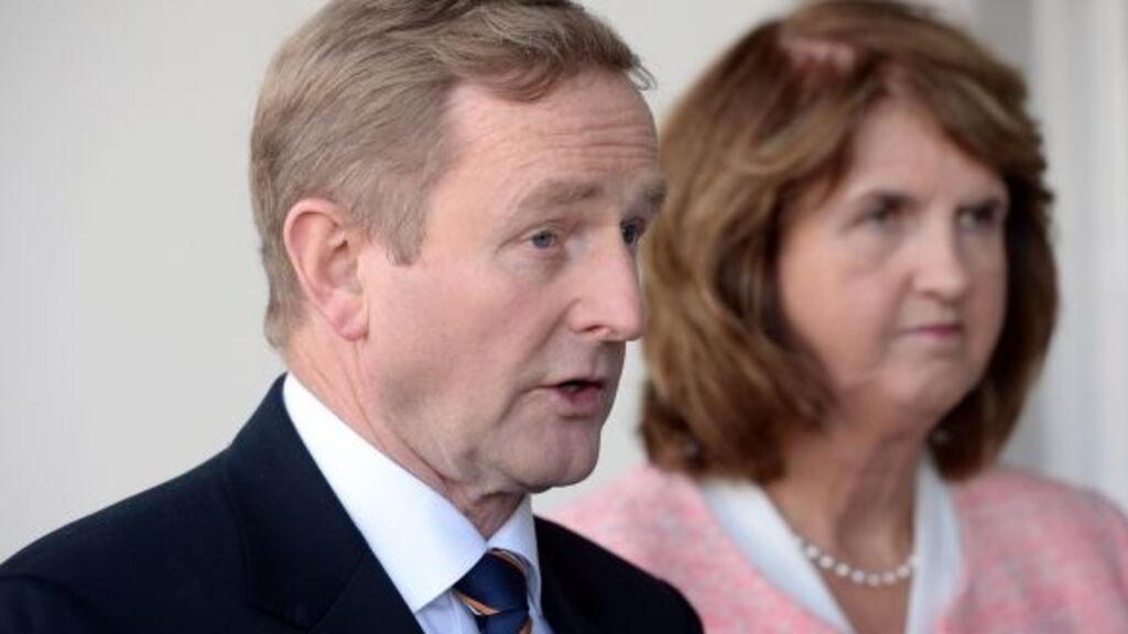 Tánaiste Joan Burton with Taoiseach Enda Kenny: Mr Kenny declined again to shut down speculation about a November poll. Photograph: Eric Luke/The Irish Times