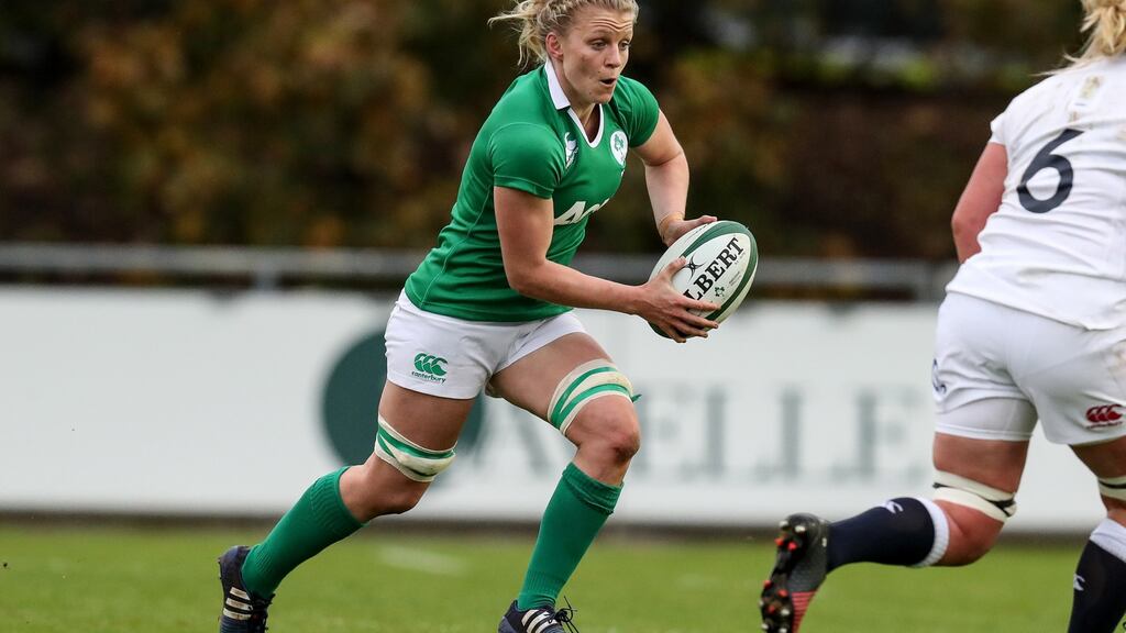 Ireland’s Claire Molloy in action against England at Belfield: “We have a lot of pride in the green shirt.” Photograph: Billy Stickland/Inpho