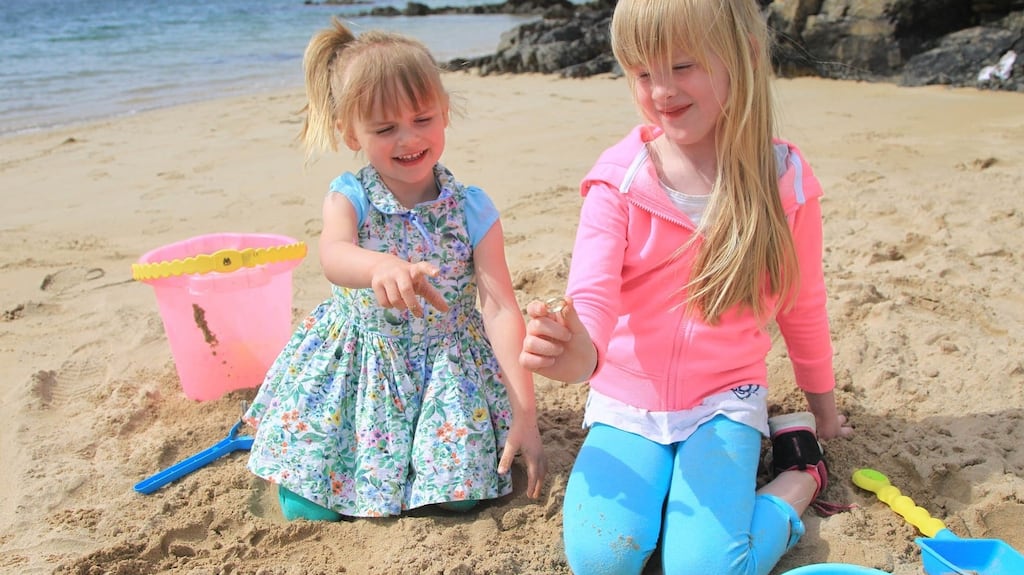 Sisters Maisie (3) and Lola Busch (6) from Lisburn who while on their holidays in Portsalon, Co Donegal, found the lost wedding ring. Photograph: Donna El Assaad