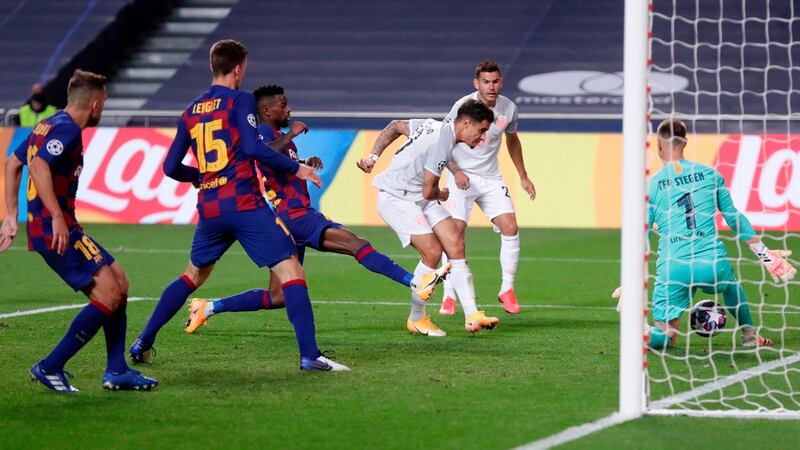 Philippe Coutinho scores his team’s eighth goal after coming off the bench. Photo: Manu Fernandez/AFP via Getty Images