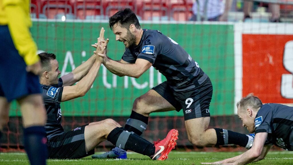Dundalk’s Patrick Hoban celebrates scoring a late goal with Robbie Benson during their win over St Pat’s. Photo: Morgan Treacy/Inpho