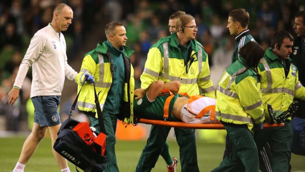 Darren Gibson is taken off on a stretcher after sustaining a knee injury at the Aviva stadium. Photograph: Cathal Noonan/Inpho