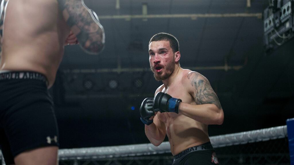 Portuguese MMA fighter Joao Carvalho (right) during his fight with Charlie Ward at the National Stadium in Dublin. Photograph: Dave Fogarty