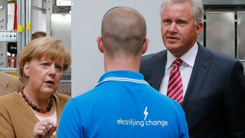 Cost cuts help GE profit beat expectations as order book swells