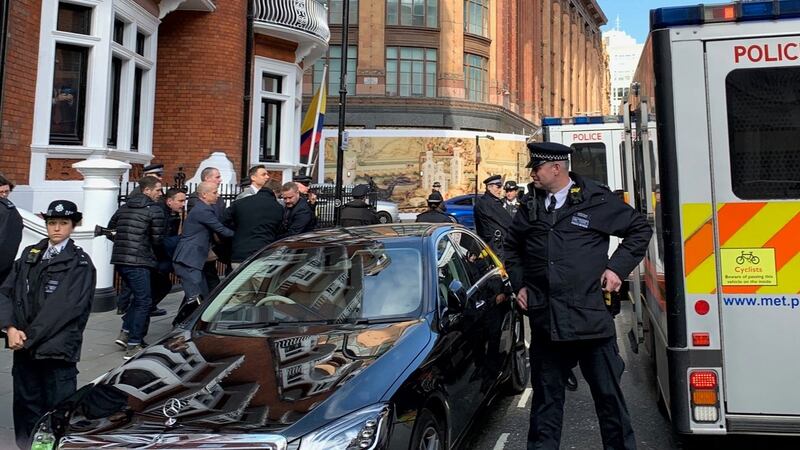 Police carry Julian Assange from the Ecuadorian embassy in London after he was arrested by police officers and taken into custody following the Ecuadorian government’s withdrawal of asylum. Photograph: PA