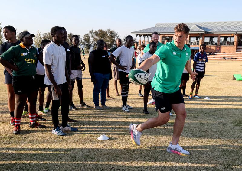 Josh van der Flier and Peter O’Mahony train with the School Of Hard Knocks Rugby Team, St Peter's College. Photograph: Dan Sheridan/Inpho