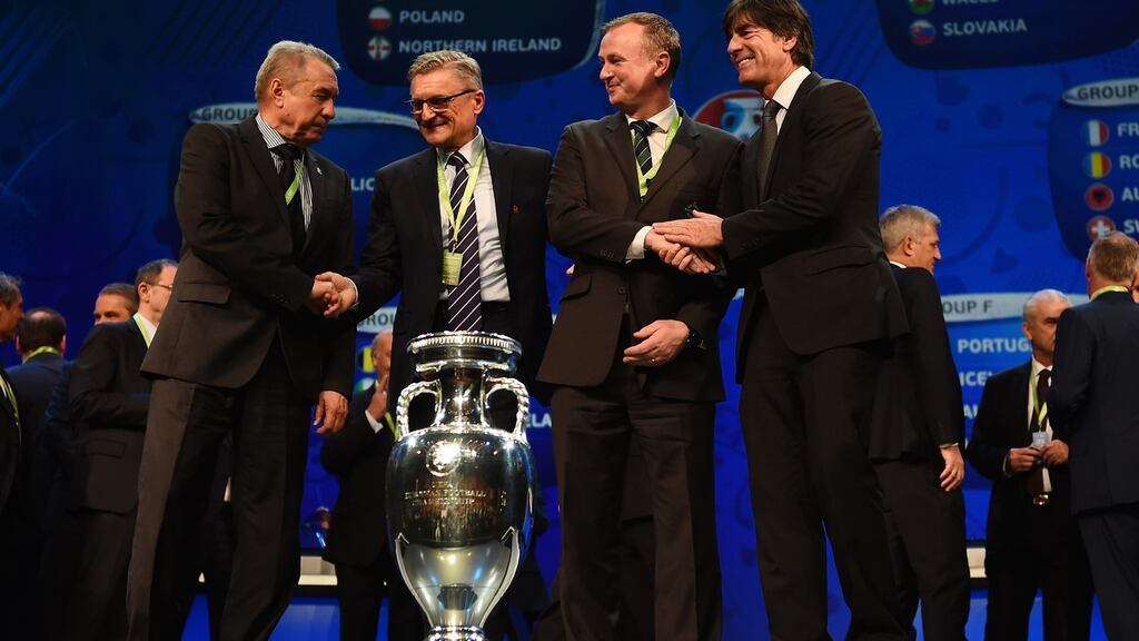 Volodymyr Onyshchenko, assistant coach of Ukraine, Adam Nawalka, manager of Poland, Northern Ireland manager Michael O’Neill and Joachim Löw pose for photographs during the Euro 2016 draw at Palais des Congres in Paris. Photograph: Laurence Griffiths/Getty Images