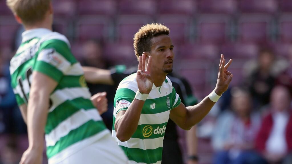 Scott Sinclair scored a hat-trick as Celtic beat Hearts 5-0 to secure a sixth consecutive Scottish title. Photograph: Andrew Milligan/PA