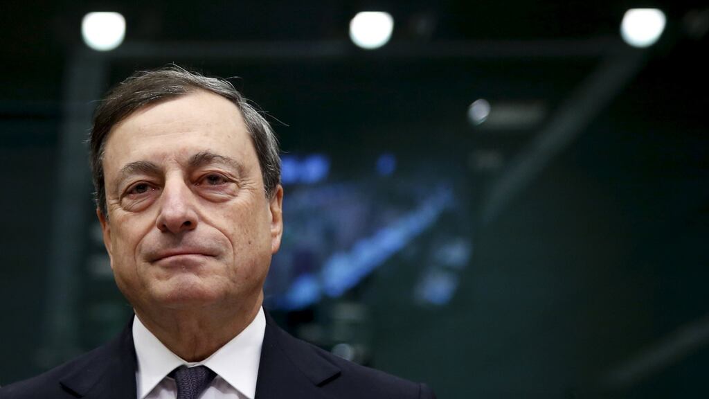 European Central Bank (ECB) president Mario Draghi waits for the start of a eurozone finance ministers meeting in Brussel on Thursday Photograph: Reuters