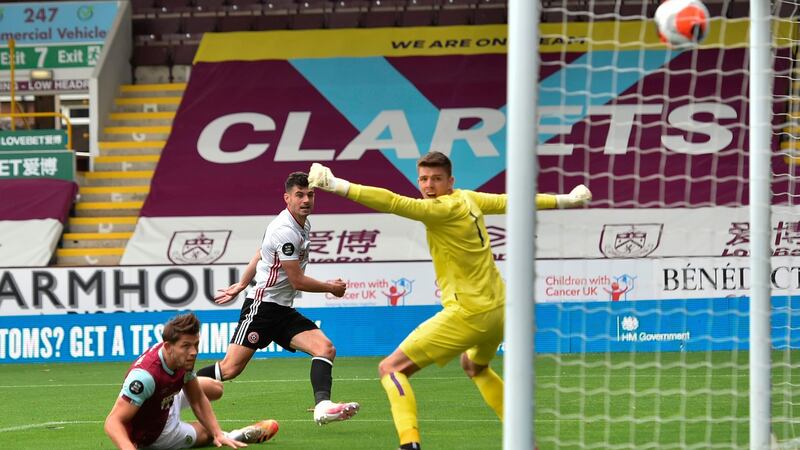 Sheffield United’s Irish defender John Egan scores a late equaliser at Turf moor. Photograph: Peter Powell/Getty/AFP