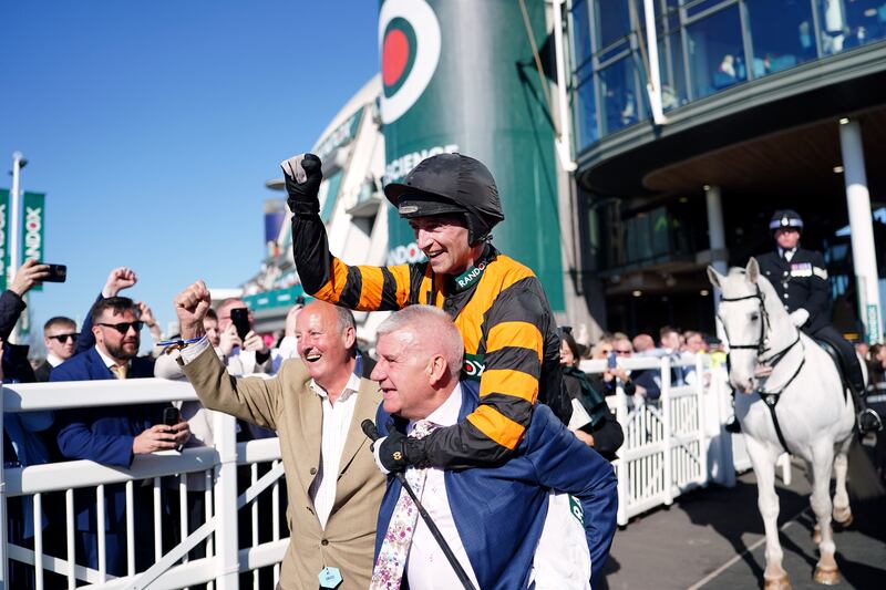 Jockey Patrick Mullins and owner Stewart Andrew celebrate Nick Rockett's Grand National win at Aintree. Photograph: David Davies for The Jockey Club/PA Wire