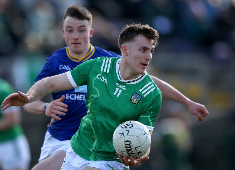 Limerick's James Naughton with John Paul Nolan of Wicklow. Photograph: Leah Scholes/Inpho