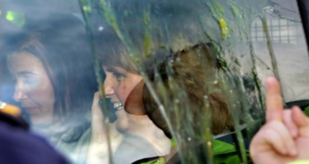 Joan Burton’s car was surrounded by anti-water charges protesters in Tallaght on Saturday