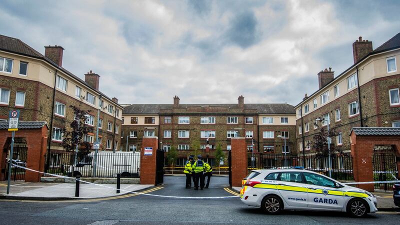 Gardaí at Avondale House Cumberland Street, Dublin, where Gareth Hutch was shot dead. Photograph: Brenda Fitzsimons/The Irish Times