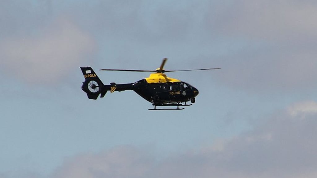 The police helicopter crew used a powerful video camera to film a couple having sex in their garden, the court heard.