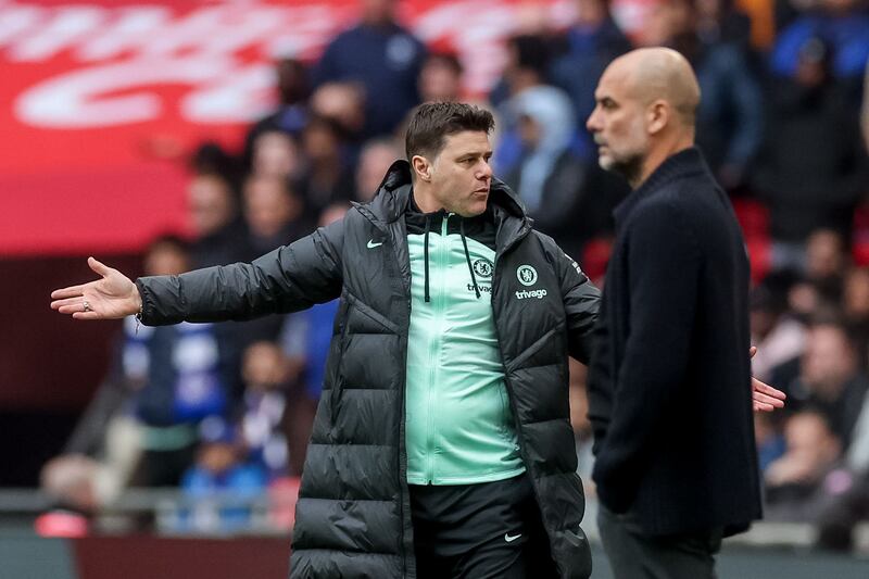 Chelsea manager Mauricio Pochettino and his Manchester City counterpart Pep Guardiola react during their FA Cup semi-final clash. Photograph: Neil Hall/EPA-EFE