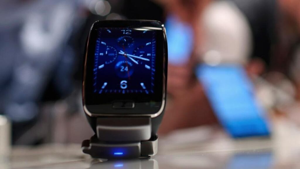 Samsung’s new Gear S smartwatch: Spritz has signed deals to stream content on the smartwatch. Photograph: Reuters/Hannibal Hanschke