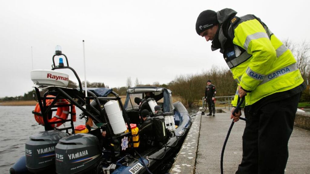 Members of the Garda sub aqua unit prepare to join the continuing search of Lough Ree for a man missing after the boat he was in with two others capsized on Thursday. Photograph: PA