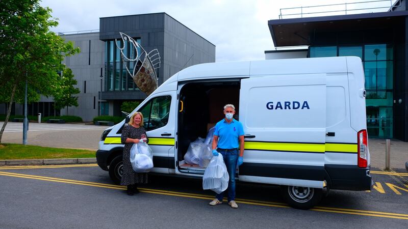 Gardaí delivering supplies of face shields produced by IT Sligo to local charities in the north west