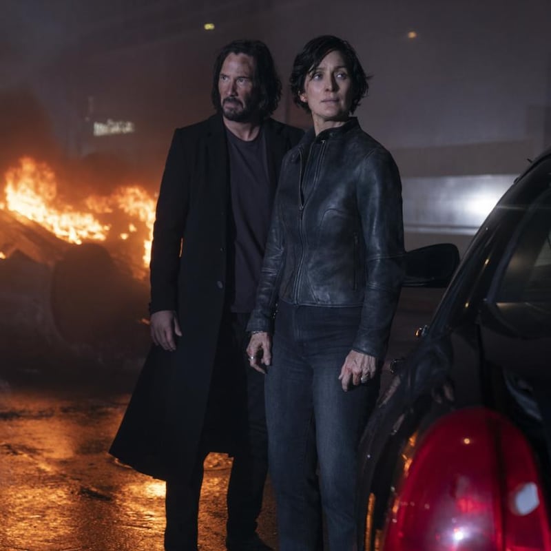 Keanu Reeves and Carrie-Anne Moss look better than they have any right to look – it must be those hardy Canadian genes