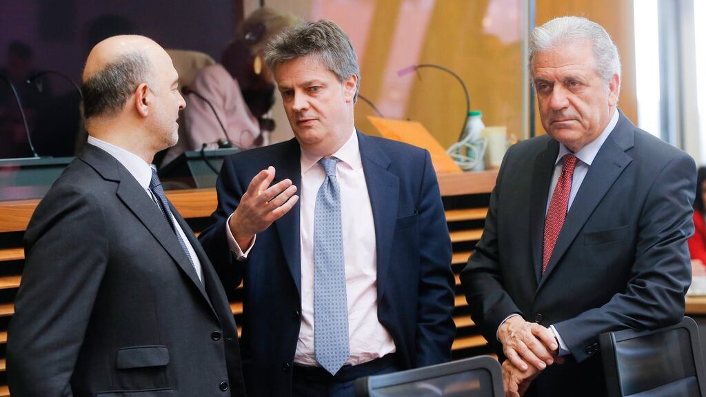 European Commissioners Pierre Moscovici, Jonathan Hill and Dimitris Avramopoulos: Mr Hill has defended the EU’s decision to confine rules on tax reporting to companies with revenues exceeding €750 million. Photograph: Olivier Hoslet/EPA