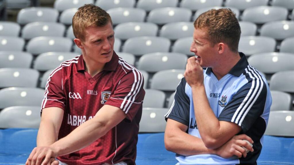Joe Canning (left) and Dublin dual player Ciarán Kilkenny in Croker yesterday to launch a GAA initiative to support the Irish language. Photograph: Barry Cregg/Sportsfile