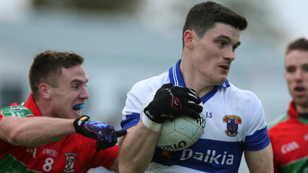 Ballymun’s Davey Byrne (left) tries to get to grips with the threat of St Vincent’s centre forward Diarmuid Connolly during the Dublin SFC final at Parnell Park. Photograph: Lorraine O’Sullivan/Inpho