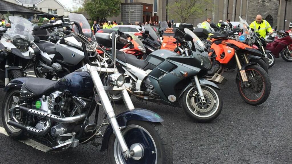 Motorcycles outside St Mary’s Church, Lucan, where hundreds of mourners came to pay their final respects to Aidan Lynam who died during a charity fundraiser on Sunday. Photograph: Dan Griffin