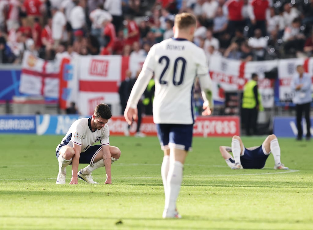 Declan Rice of England looks dejected as players of England react. Photograph: Alex Grimm/Getty