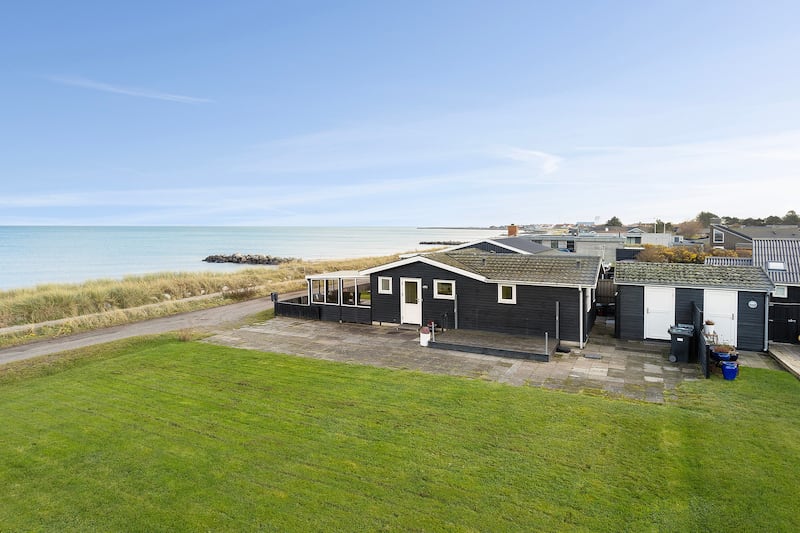 This Danish home is just metres from the water