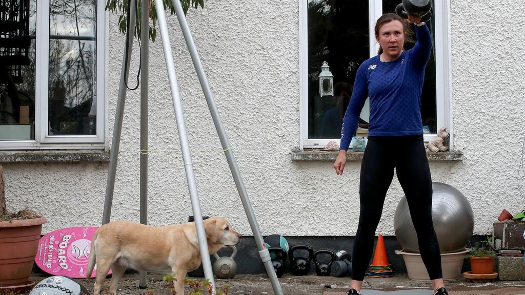 Annalise Murphy, pictured here with her dog Lyza while training, is part of the Sanctuary Runners virtual exercise group. Photo: Bryan Keane/Inpho