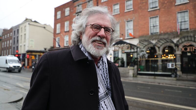 A Sinn Féin party member spoke with former leader Gerry Adams before giving evidence to gardaí on the death of Detective Garda Adrian Donohoe. File photograph: Nick Bradshaw/The Irish Times.